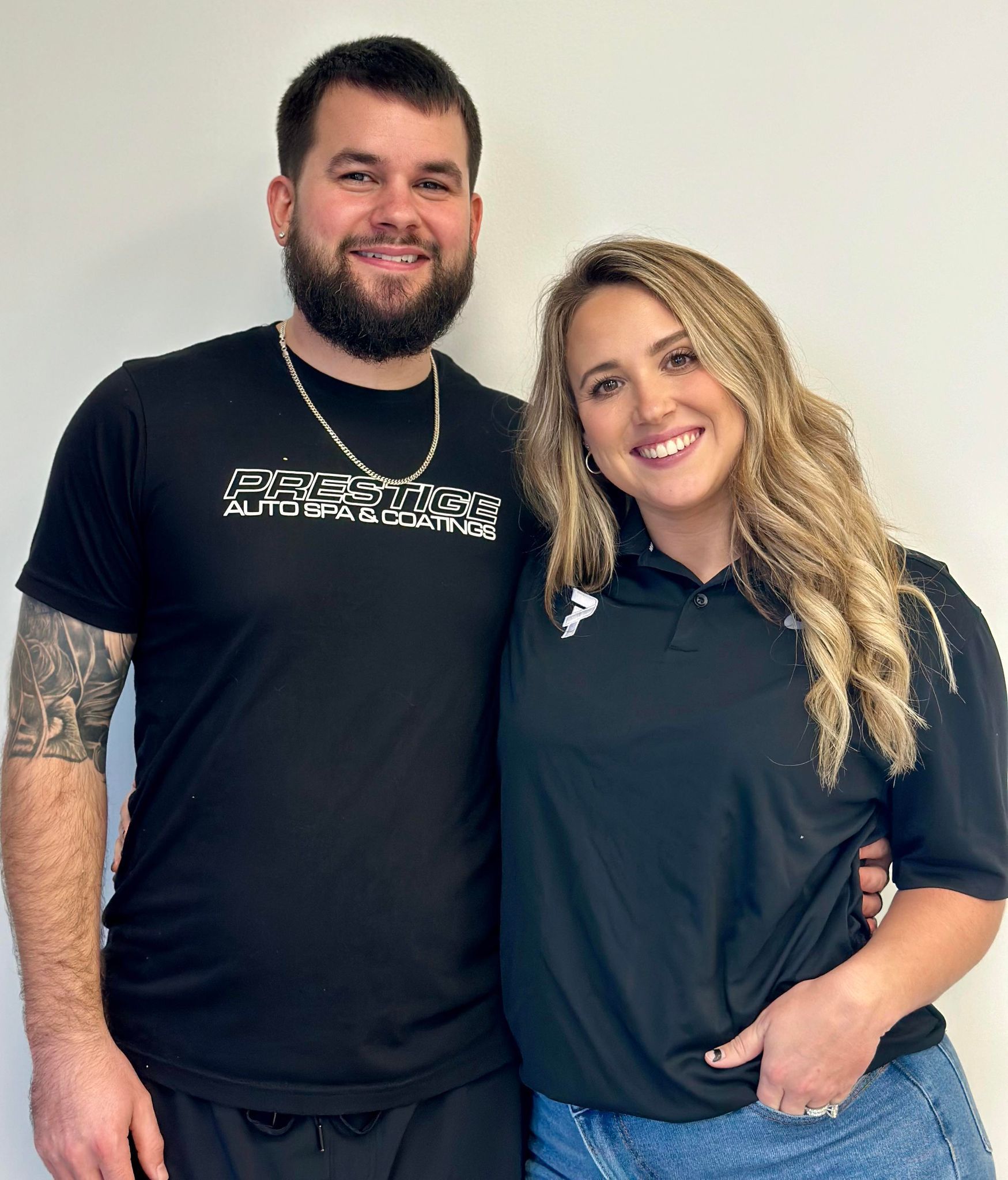 A man and a woman are posing for a picture together.