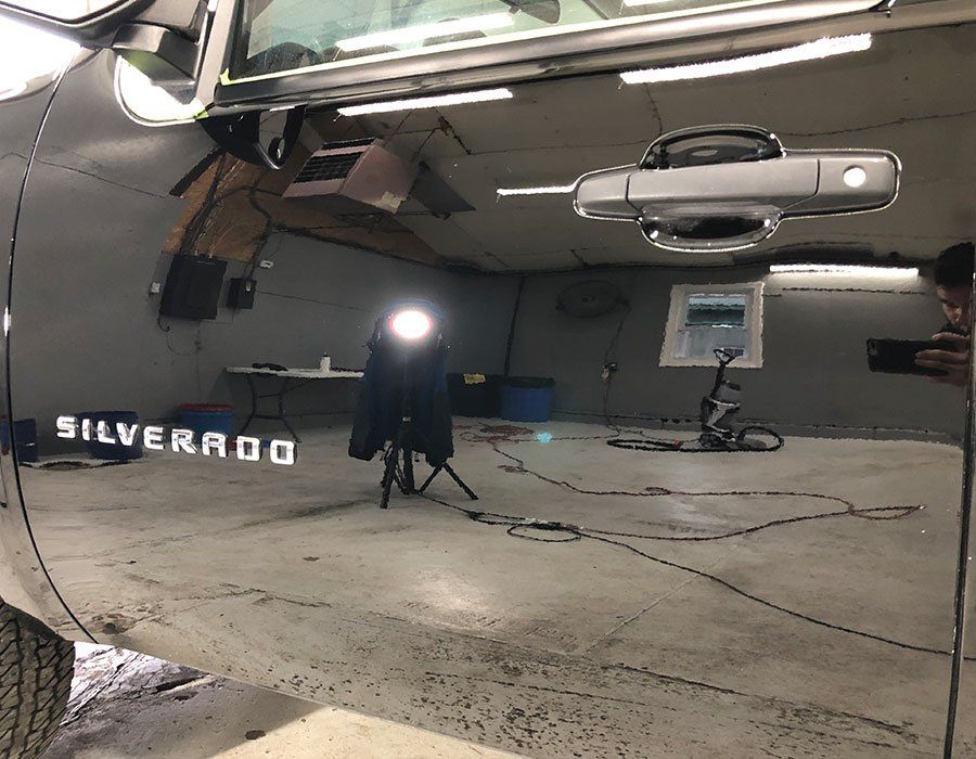 black car after paint correction