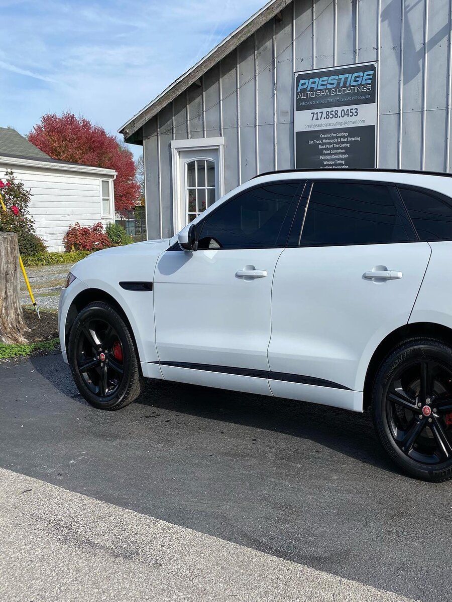 ceramic coating service in a white car