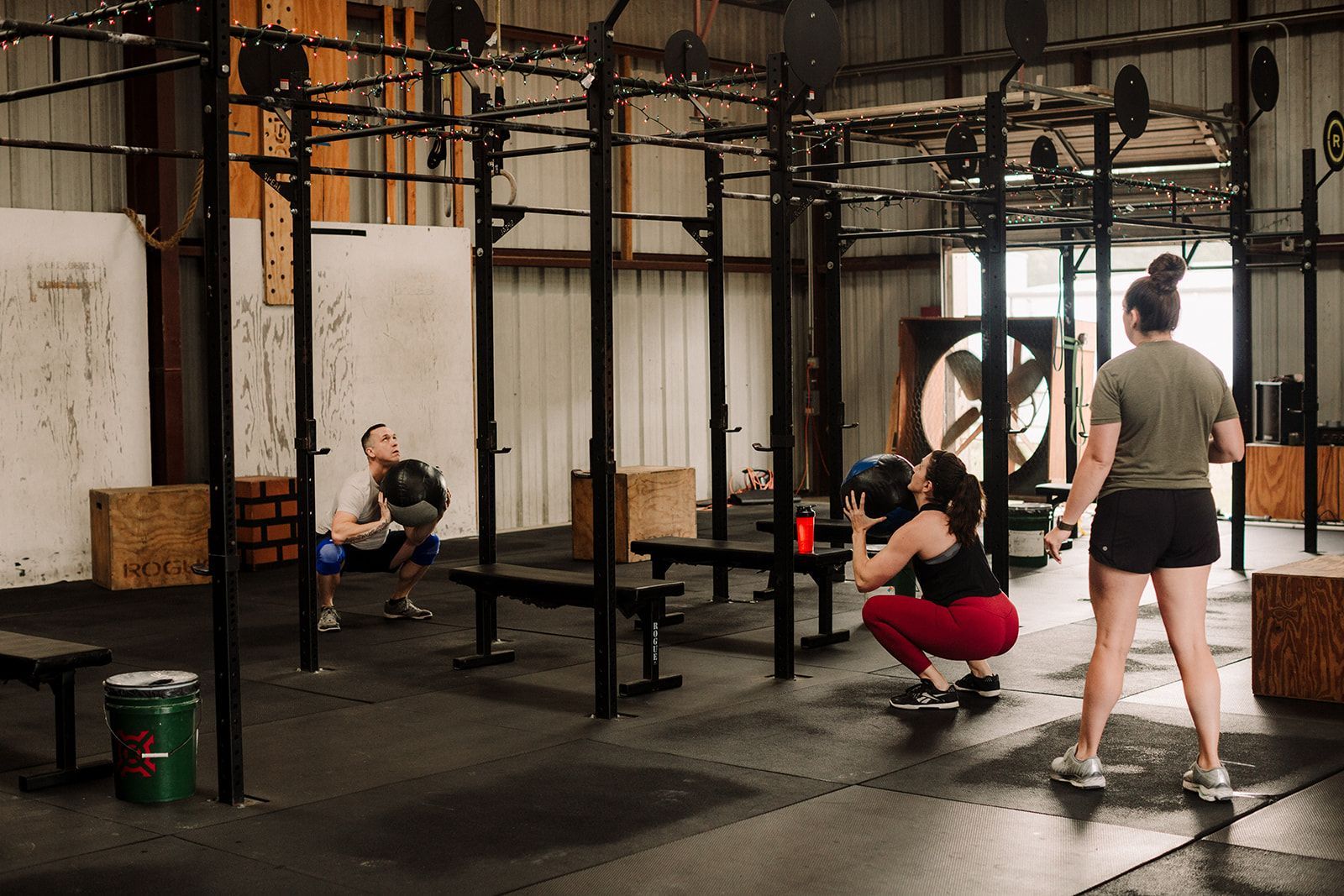 A group of people in a workout class at Rose City Barbell Club gym in Thomasville, GA