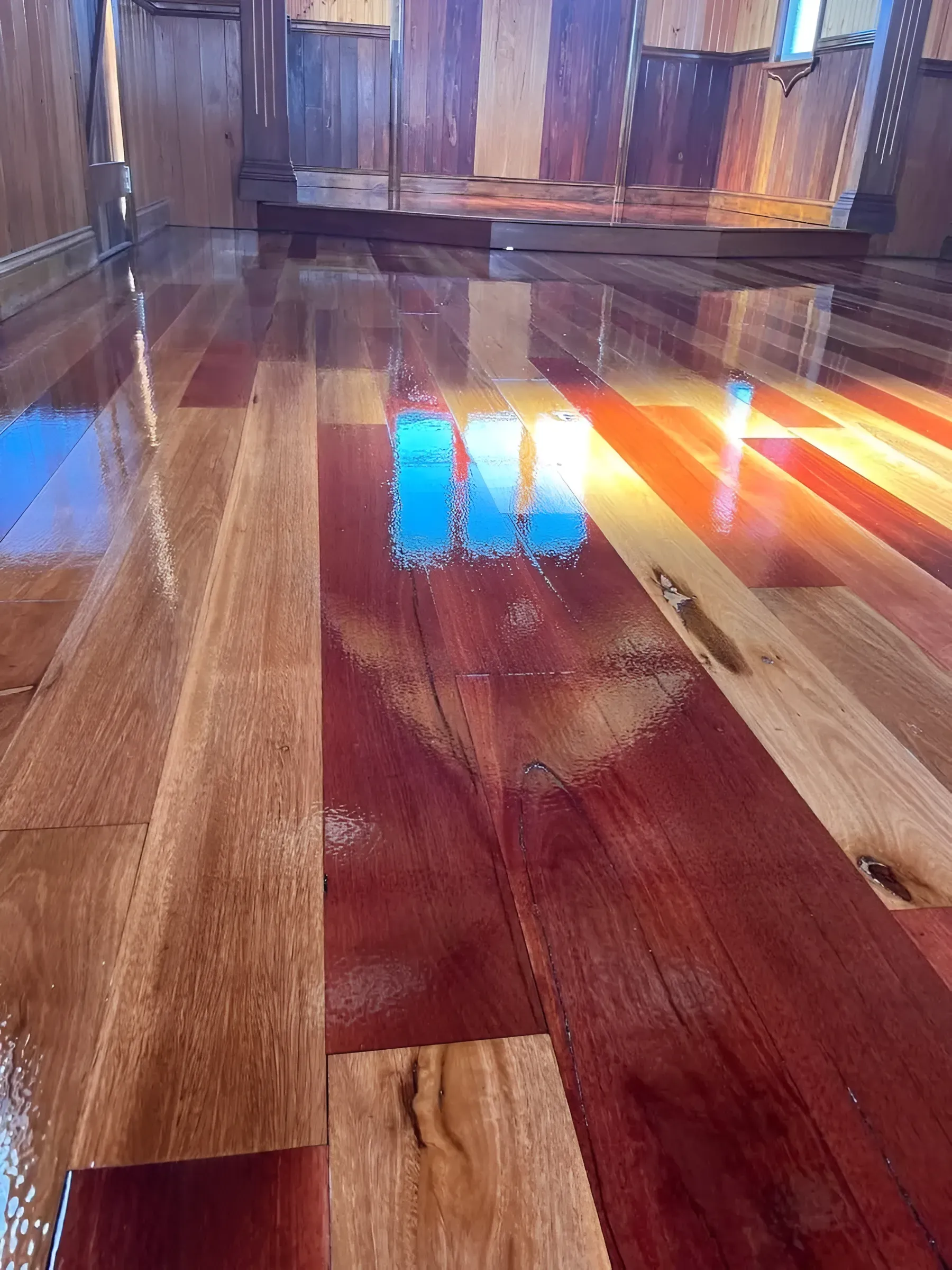 Shiny Polished Hardwood Floor with A Reddish-Brown Hue — Toowoomba Polished Floors in Highfields, QLD