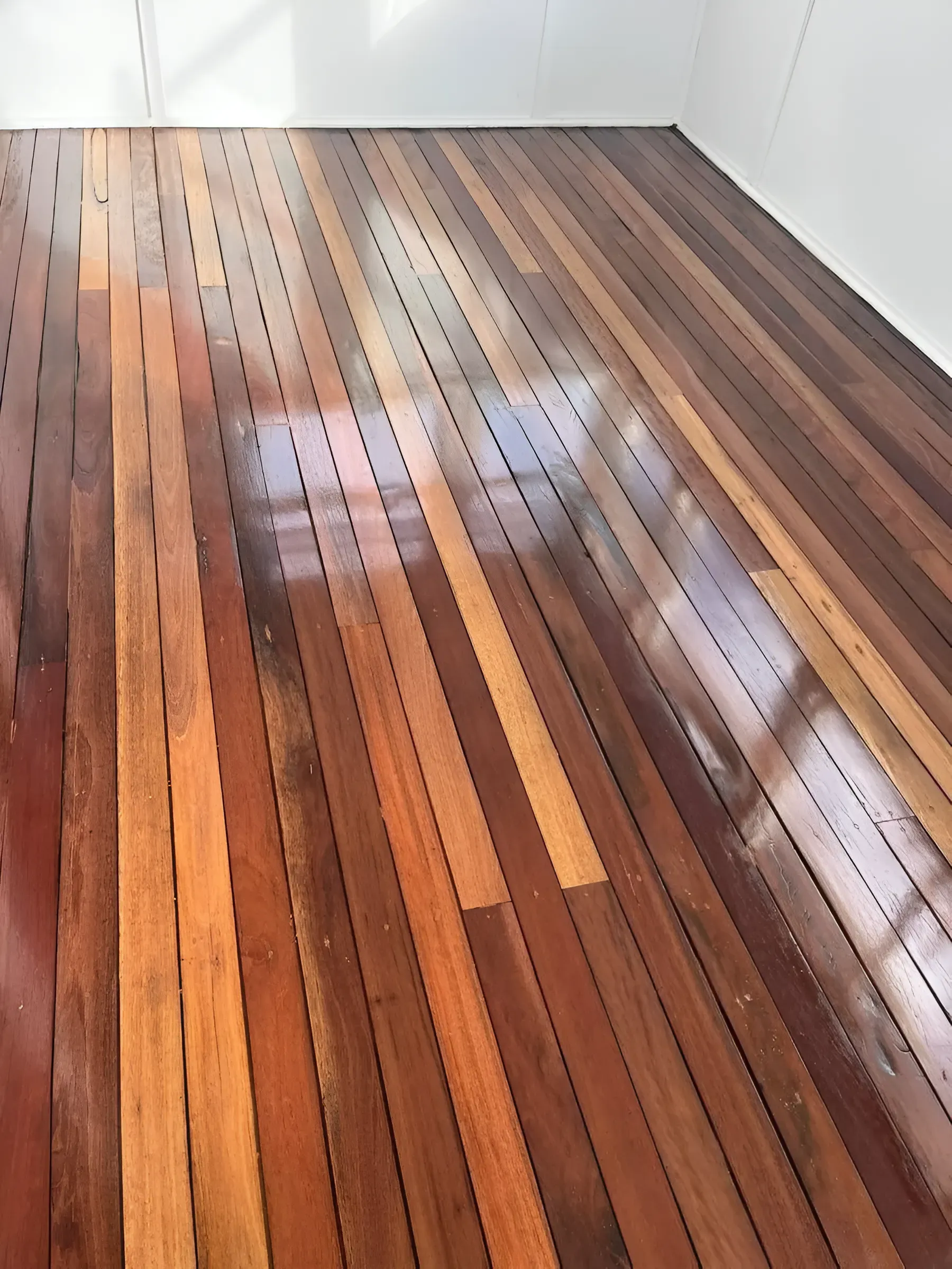 Newly Polished Hardwood Floor with Varying Shades of Brown — Toowoomba Polished Floors in Highfields, QLD