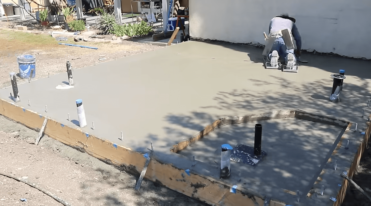 Concrete contractor pours a new foundation for a hose in bridgeport, CT