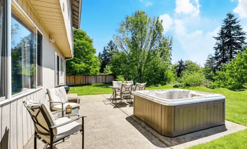 Patio builder pours 15X15 slab in a resident's backyard in bridgeport, CT