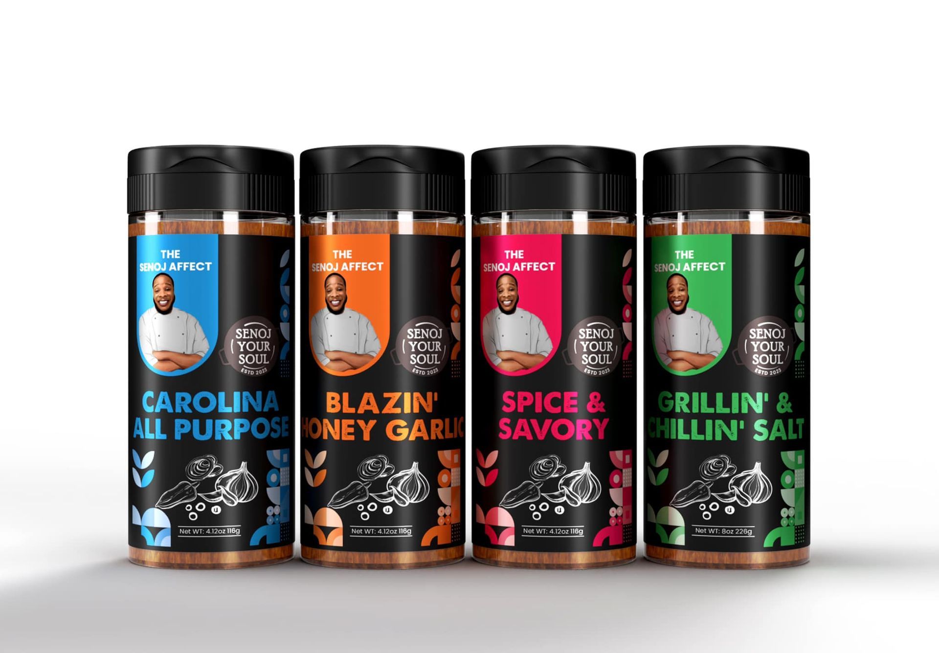 Four bottles of spices are sitting next to each other on a white surface.