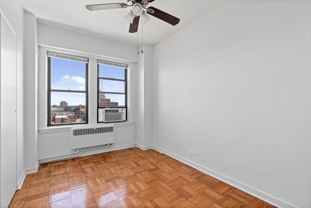 classic style interior with fan and windows