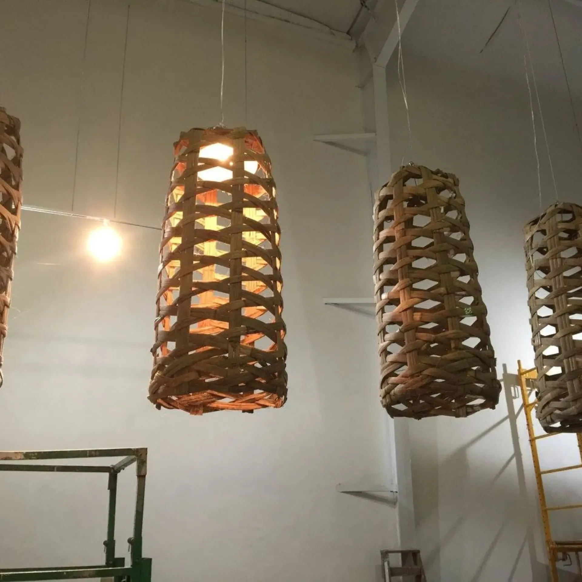 Service of Knights LLC - A bunch of wicker baskets hanging from the ceiling