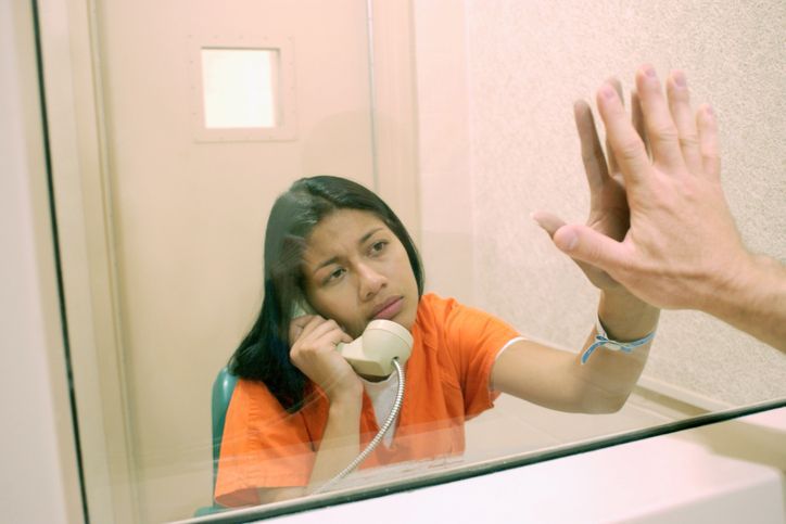 Woman holding a telephone