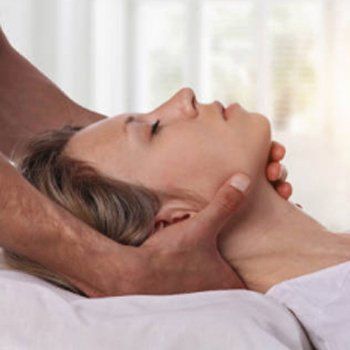Woman's head supported in hands
