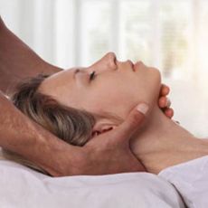 Woman's head supported in hands