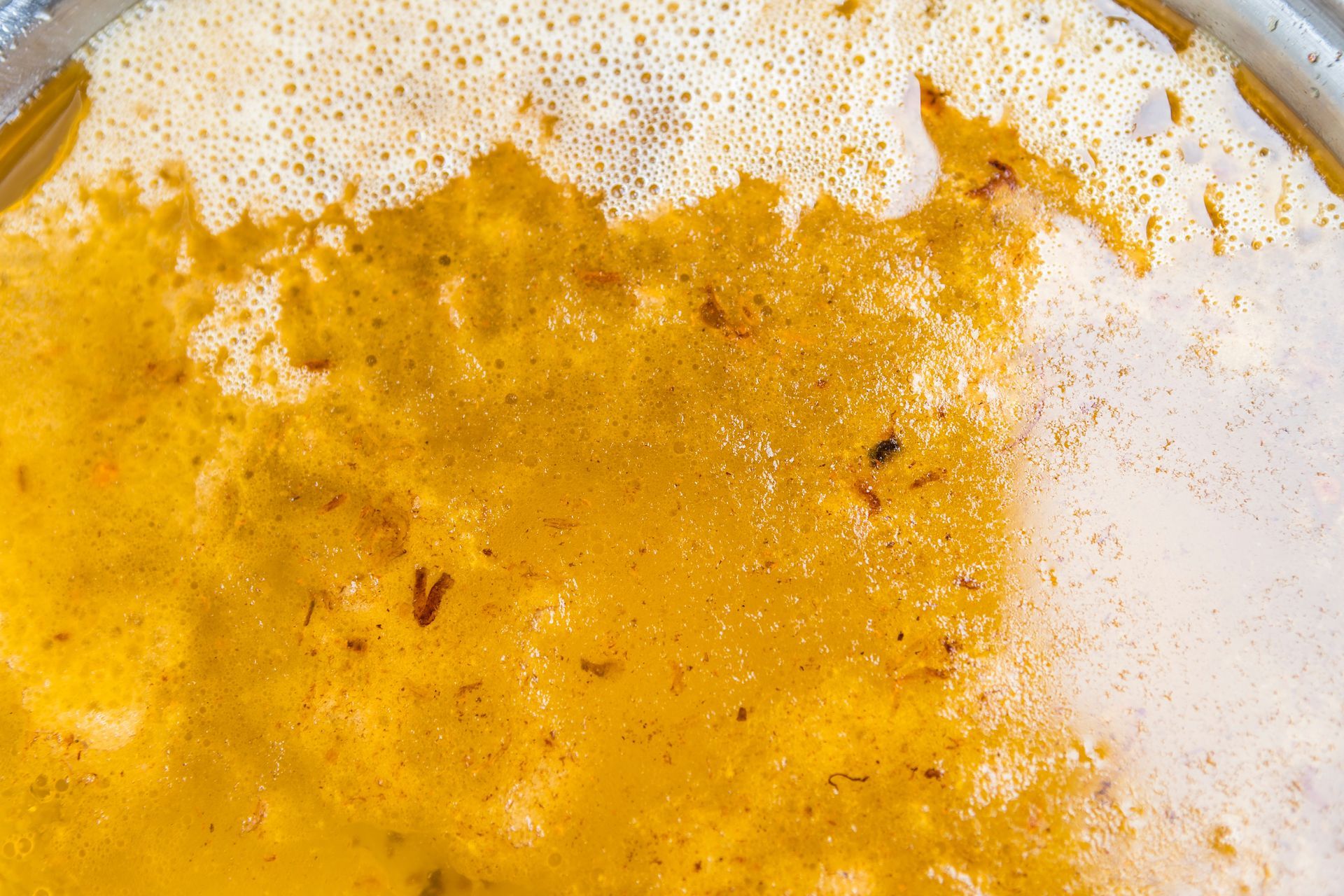 Closeup old cooking oil with dishwashing liquid. Closeup old cooking oil with dishwashing liquid.