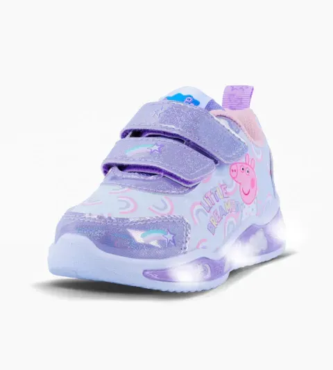 Zapatillas infantiles color lavanda con diseño de unicornio y personaje rosa, mostradas sobre un fondo blanco.