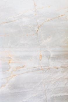 Light gray marble surface with faint white and beige veining