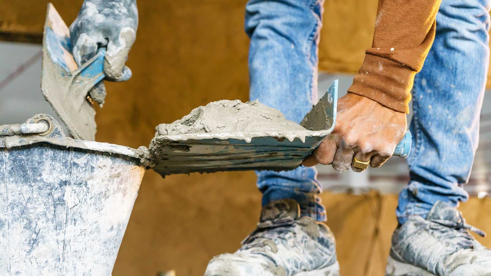 Filling cement into foundation