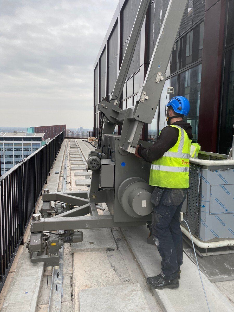 Trolley system BMU for facade access and maintenance