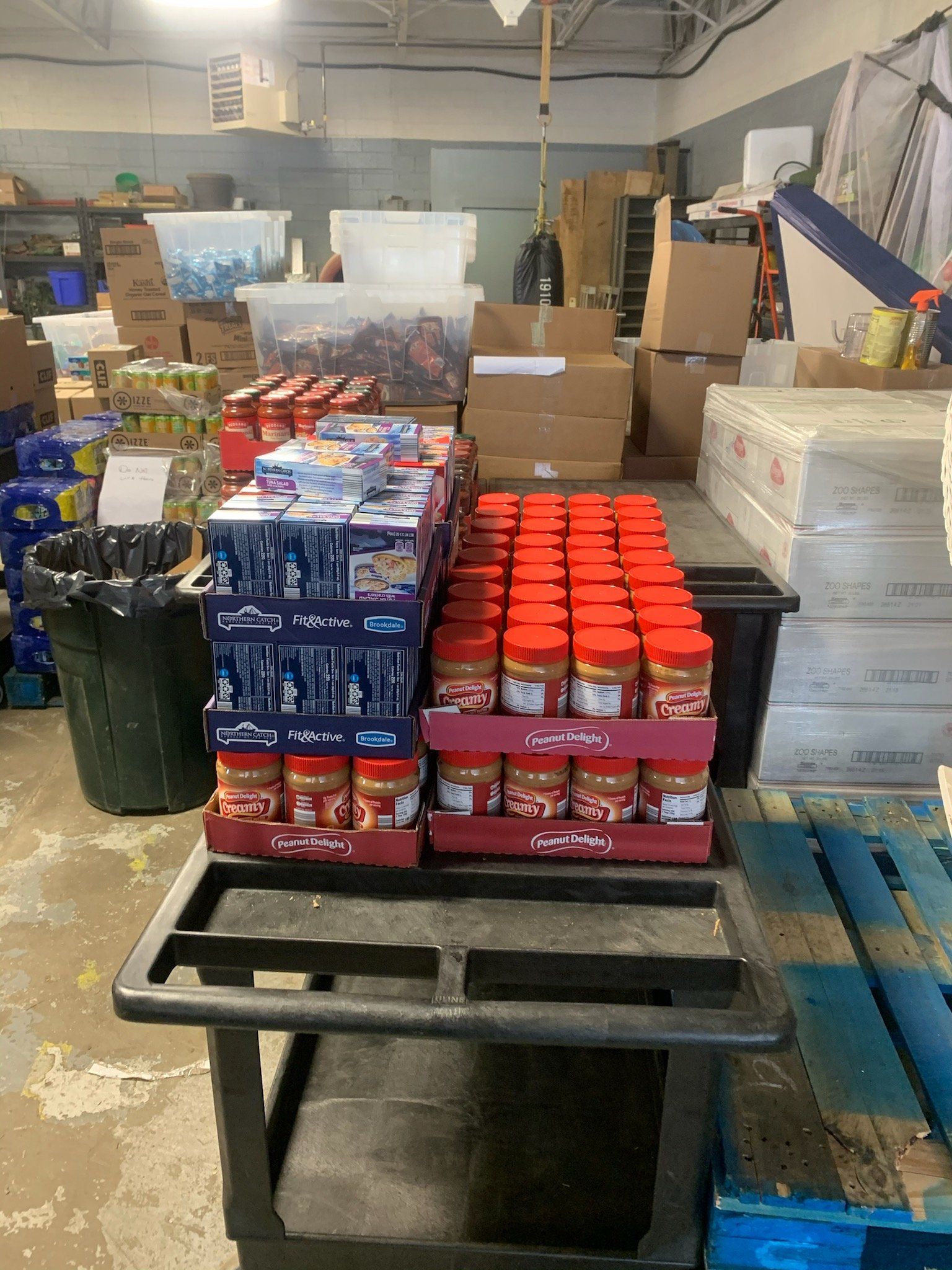 A warehouse filled with lots of food and boxes.