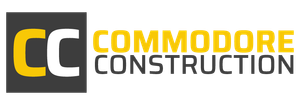 Commodore Construction logo with yellow and gray “CC” icon and company name in black and yellow text