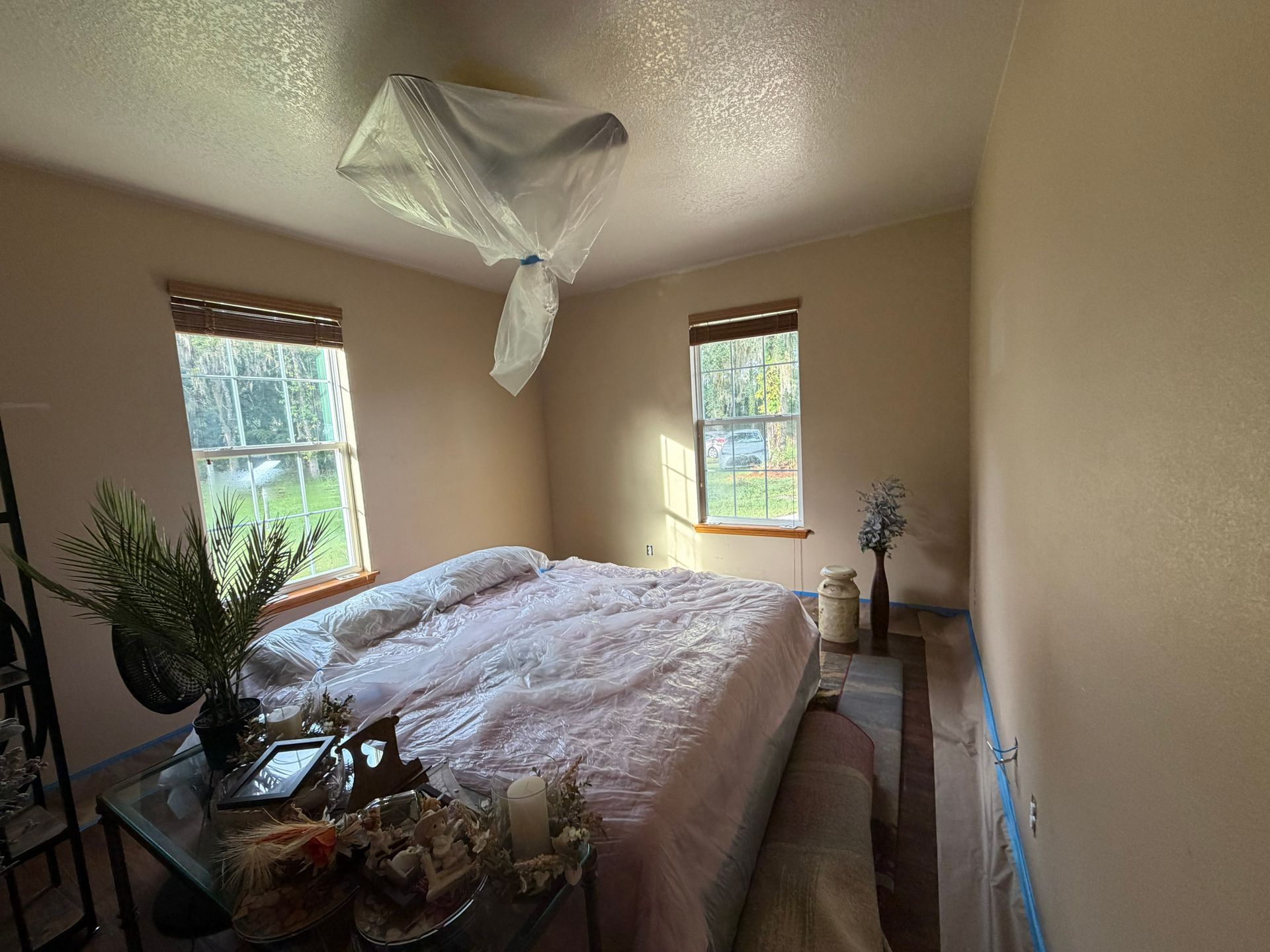 before painting guest bed room covering furniture