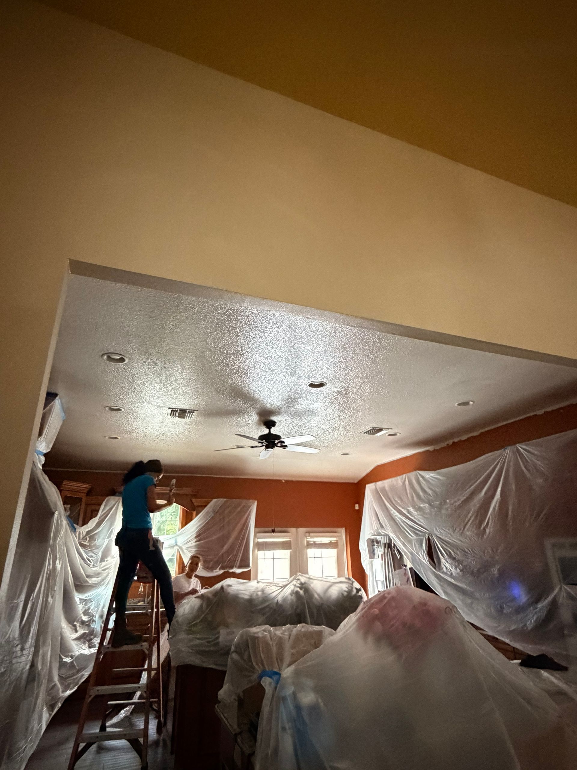 masking and painting process in kitchen