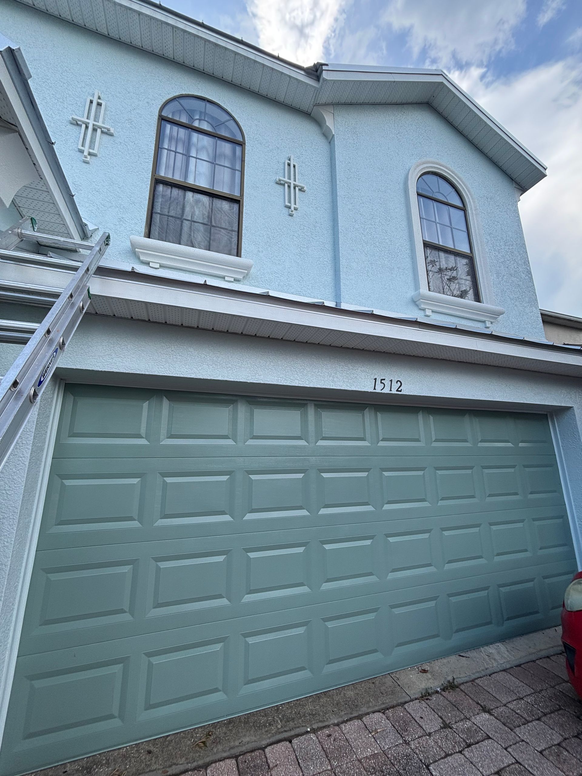 Garage door primed and painted with premium DTM coating in DeLand, Florida