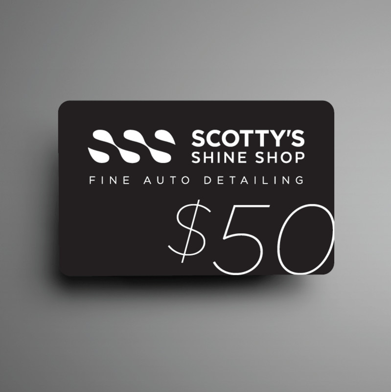Black business card for Scotty’s Shine Shop, fine auto detailing, with $50 in white text.