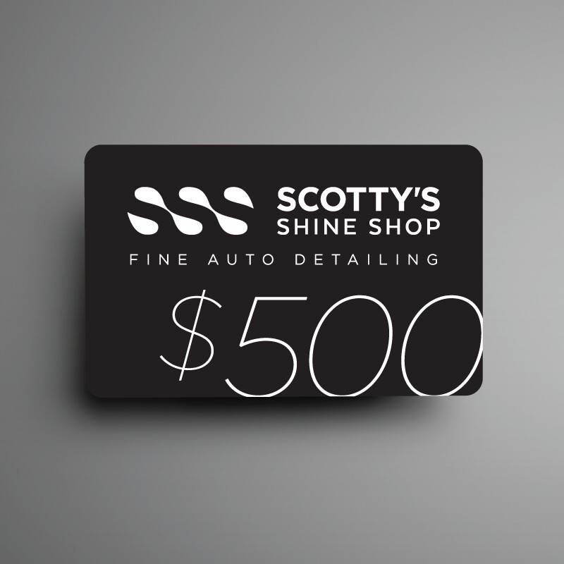 Black business card for Scotty’s Shine Shop, fine auto detailing, with $500 in white text.