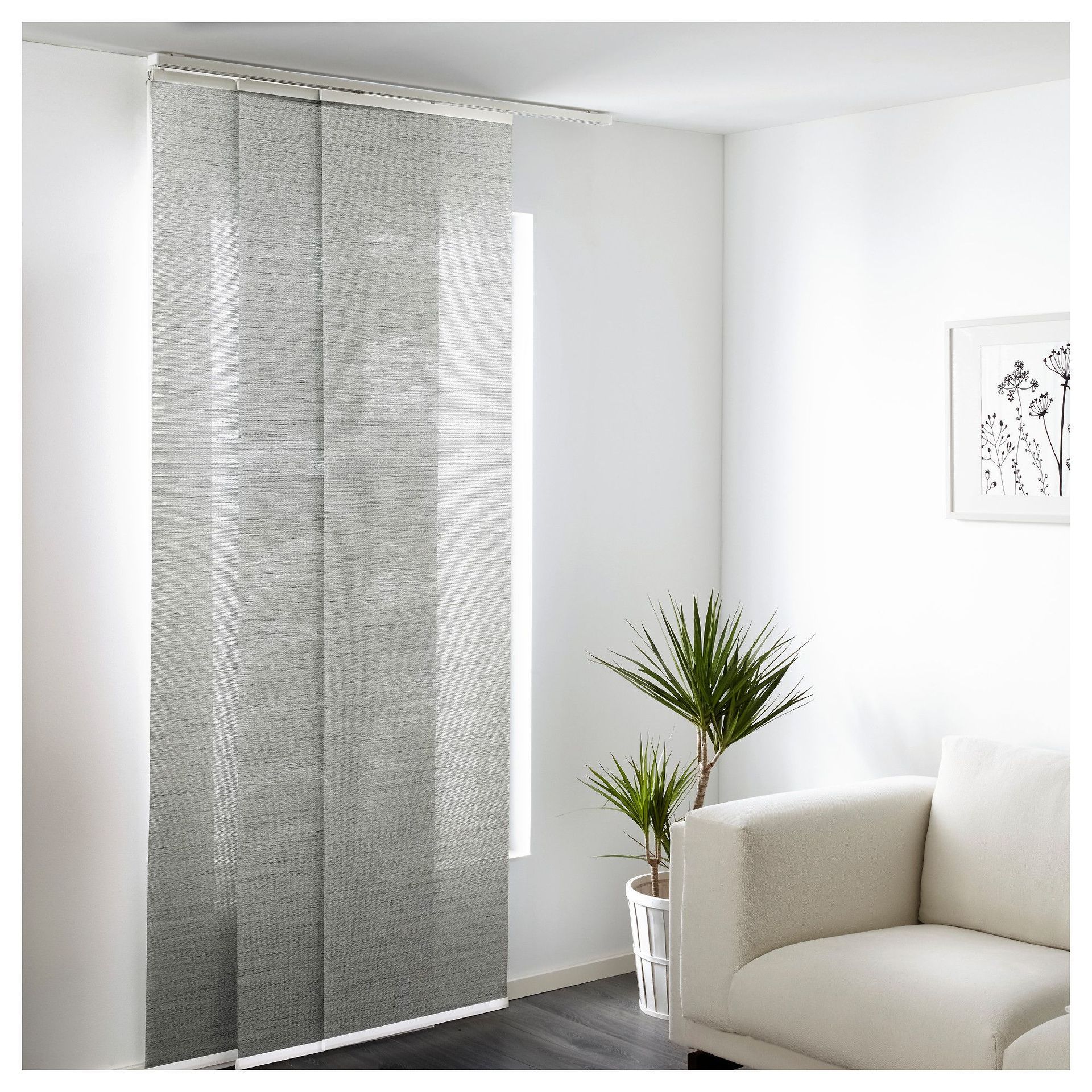 Gray Roller Blinds Covering a Window. the Blinds Are Partially Down — Instyle Curtains & Blinds in Bungalow, QLD
