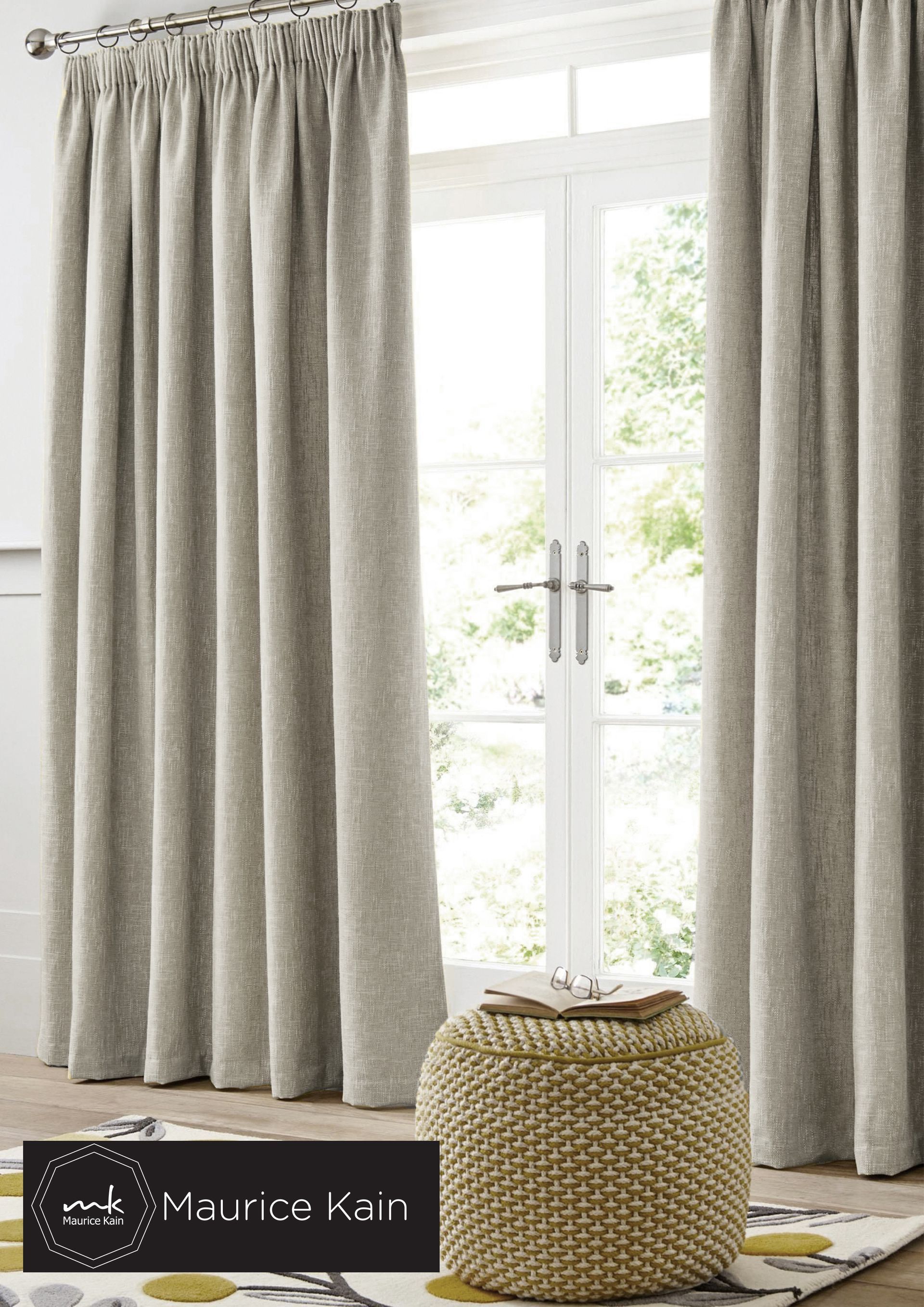 Tan Curtains Frame a Window. a Chair and Rug Are in Front — Instyle Curtains & Blinds in Bungalow, QLD