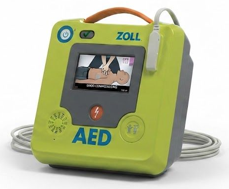 Green Zoll AED defibrillator with a small screen and coiled cables