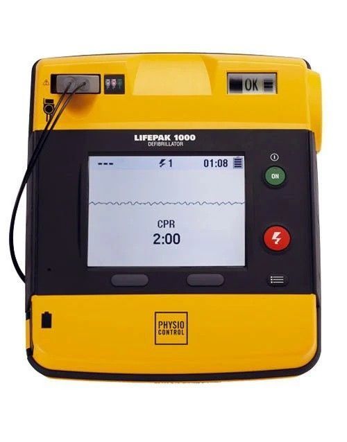 Yellow AED defibrillator with screen and buttons on white background