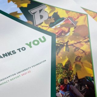 Autumn-themed brochure cover with “Thanks to you” text and a large “B,” showing colorful leaves and a person outdoors.