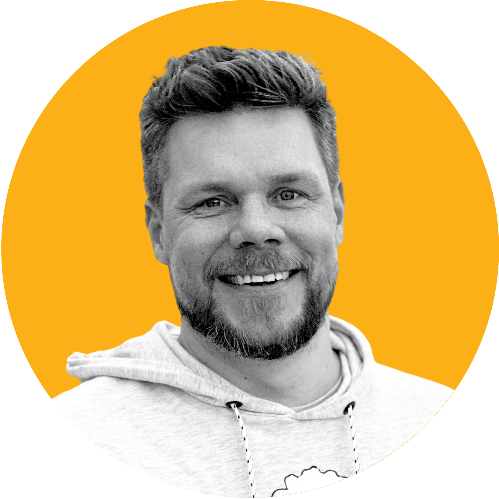 Smiling man in a light hoodie against an orange circle background.