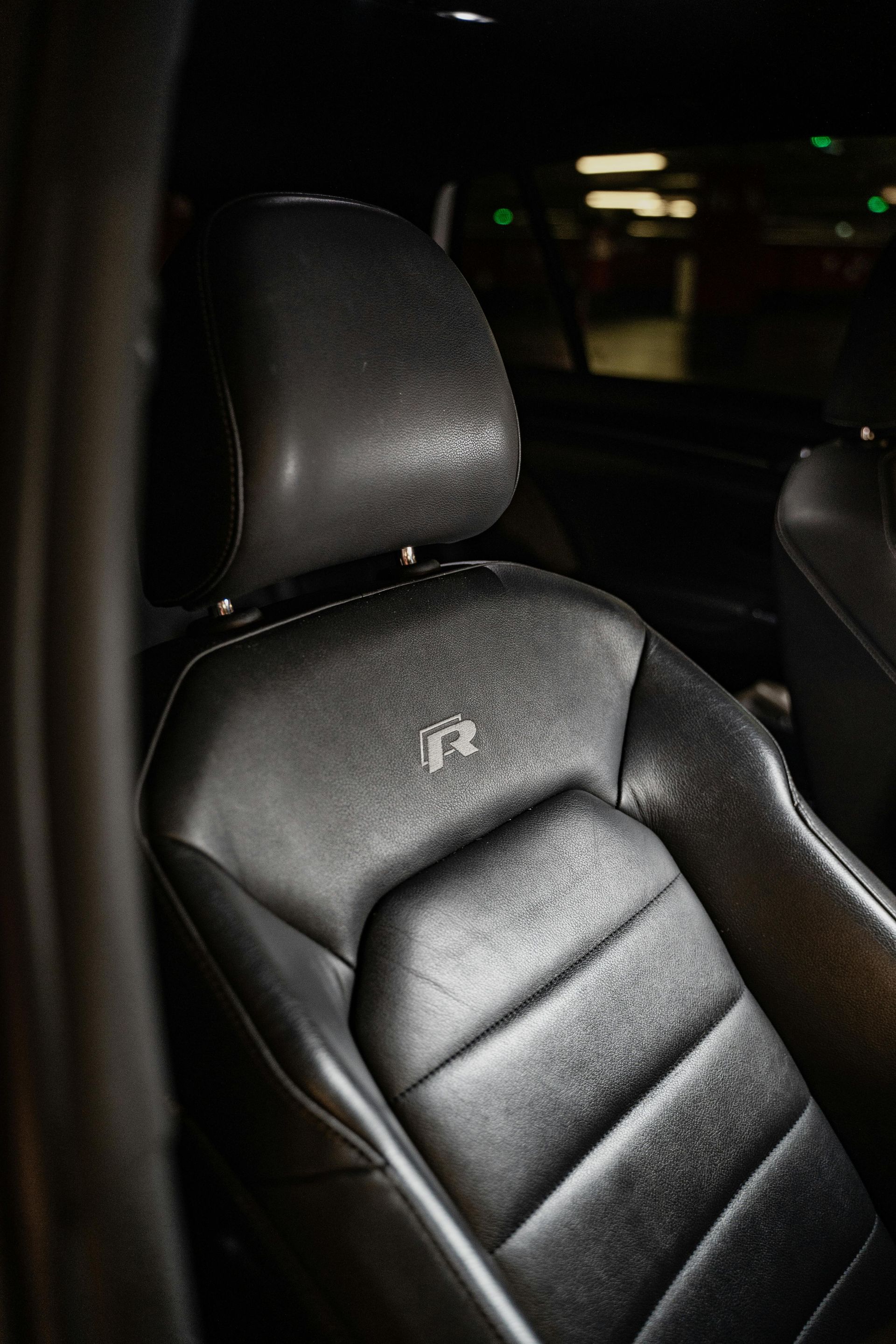 Black leather car seat with