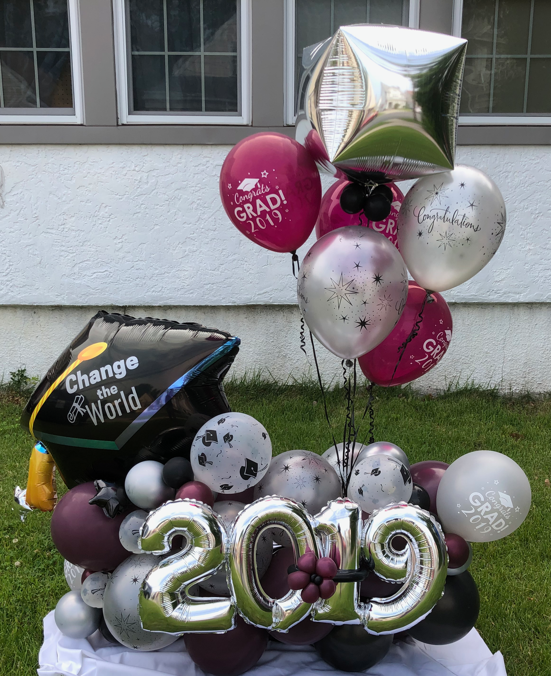 Graduation balloon arrangement with silver
