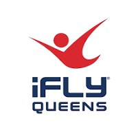 IFLY Queens logo: Red figure flying upward above blue text