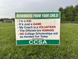 Green CCSA yard sign listing “Reminders from your child” with humorous kid based logic.