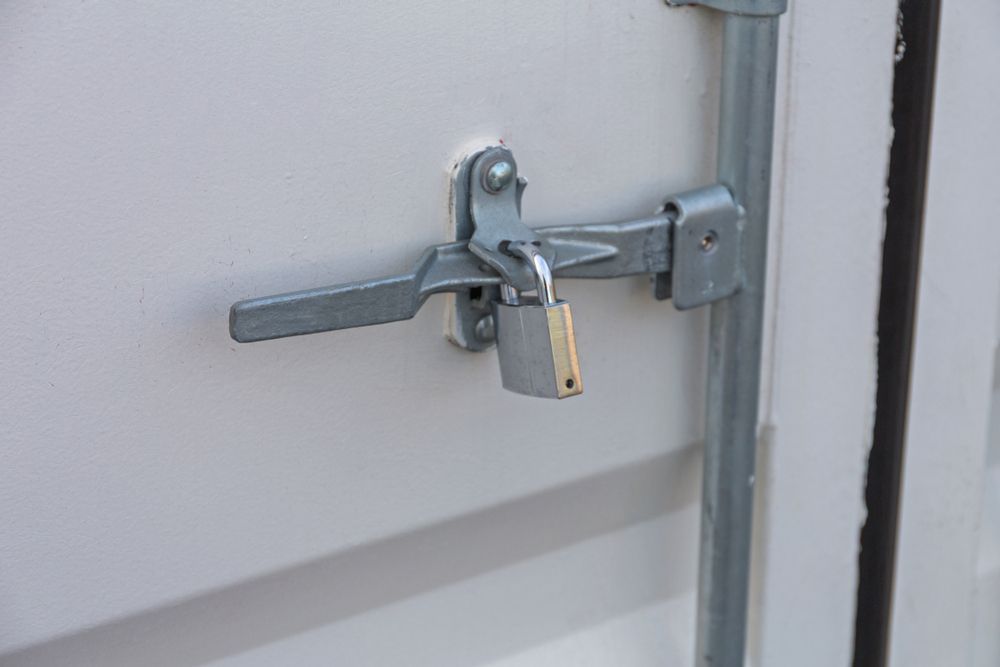 A Close Up of a Door With a Padlock on It — Darwin Lock & Key In Humpty Doo, NT