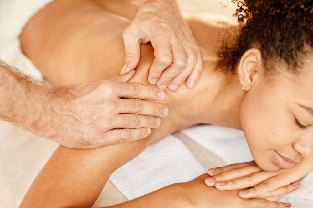 A massage therapist learning to do myofascial release for CEU