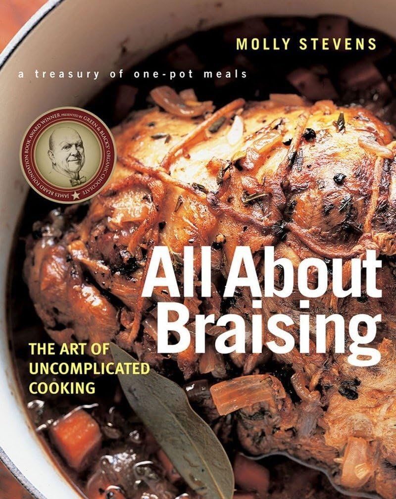 Cookbook cover for All About Braising with a braised meat dish and a bay leaf