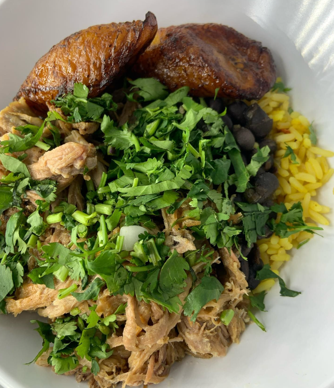 Cuban Bowl with seasoned proteins and rice from Twisted Taco