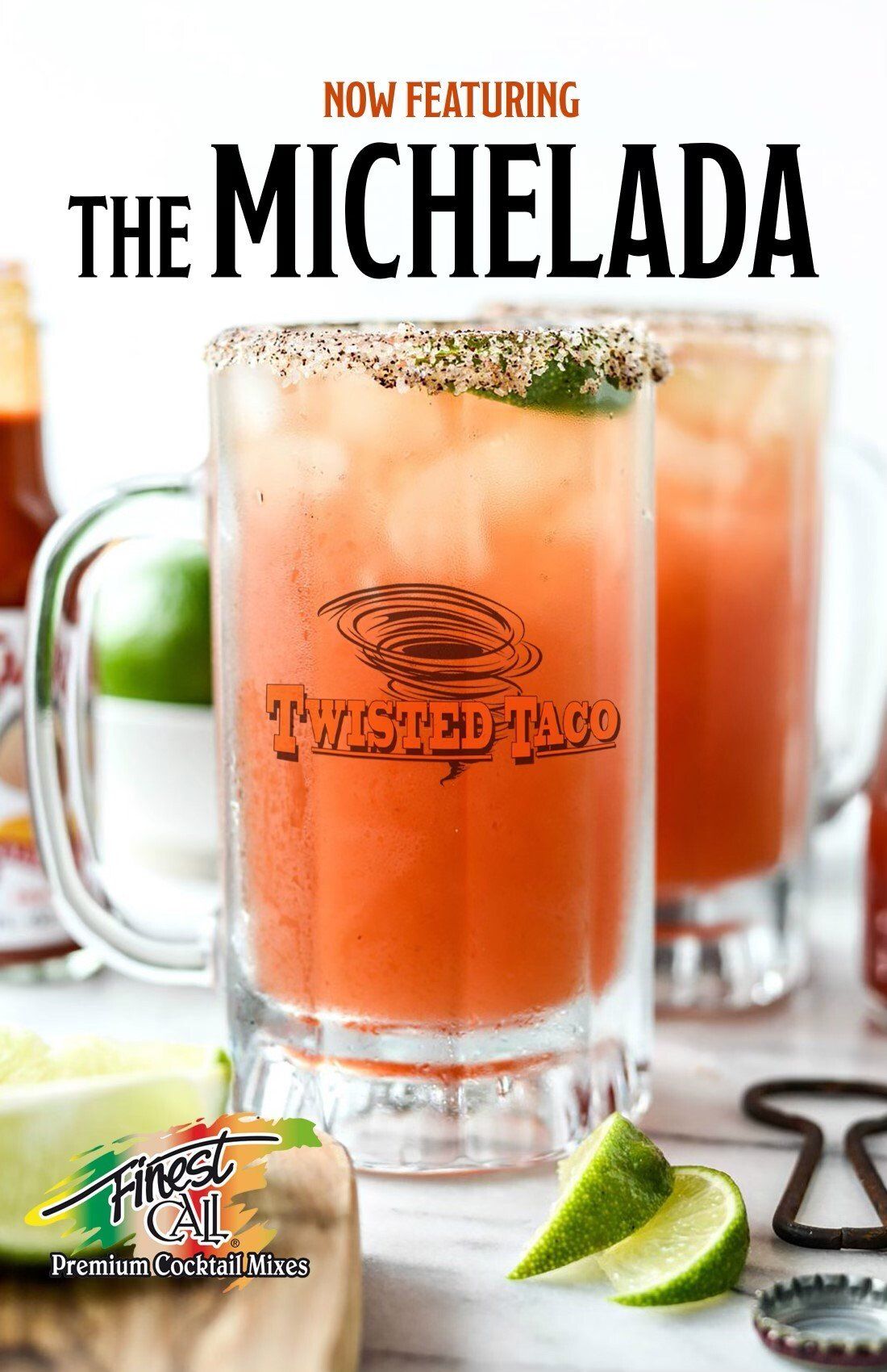A close up of a glass of michelada on a table.