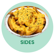 Fries topped with cheese sauce and parsley in a foil container. 
