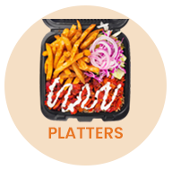 Platter with fries, slaw, and meat, drizzled with white sauce, in a black container. 
