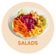 Salad bowl with carrots, cucumber, chickpeas, corn, and cabbage.