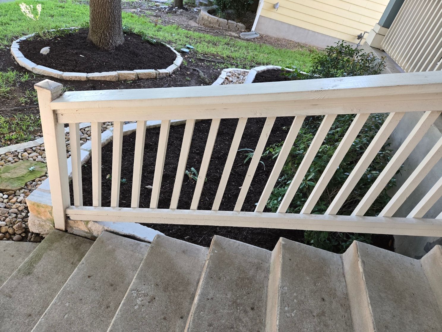 a dirty white banister