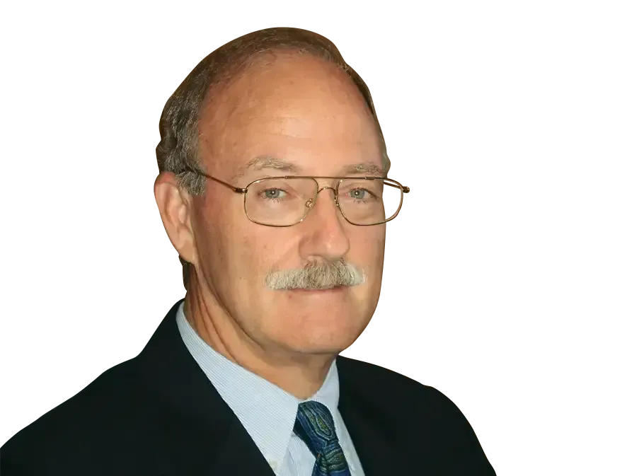A Man With Glasses and a Mustache is Wearing a Suit and Tie