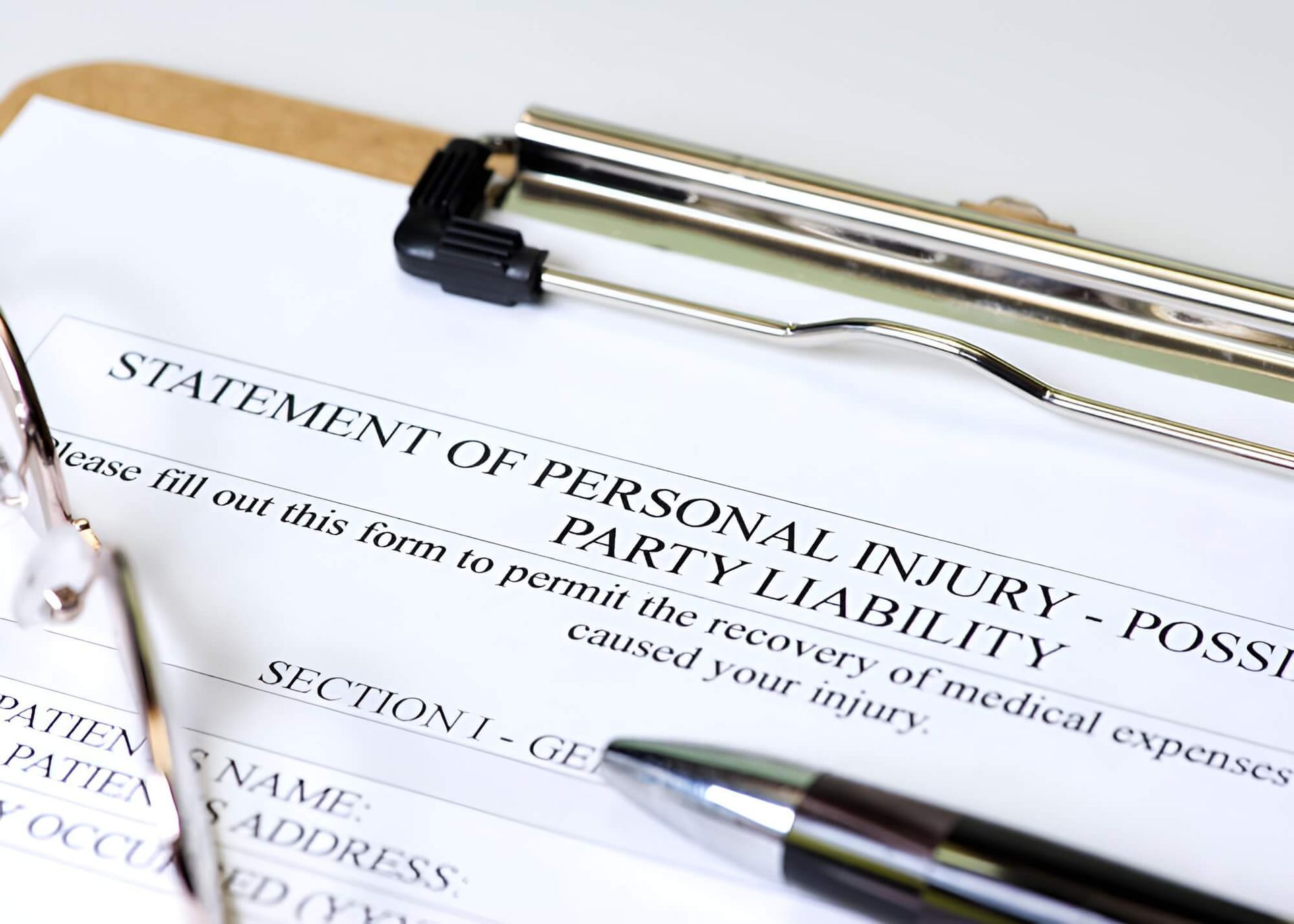 A Clipboard With a Statement of Personal Injury on It — Morris Legal & Conveyancing in Forster, NSW