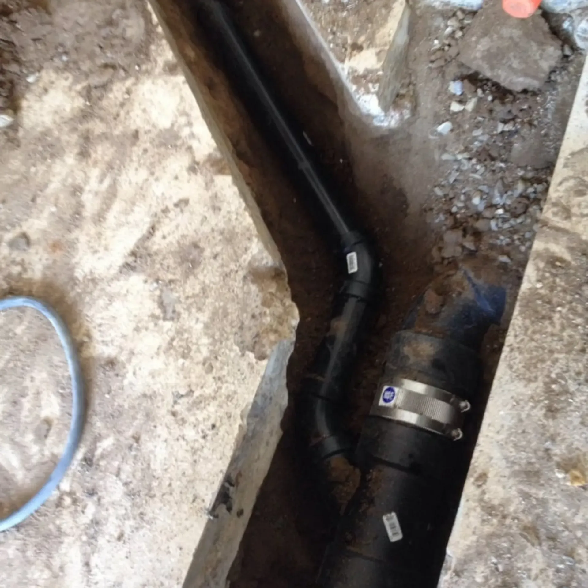 Ted & Bros Plumbing | black pipe with the letter g on it