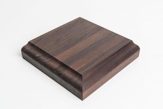 Dark wood-grain square display base with a beveled edge on a white background