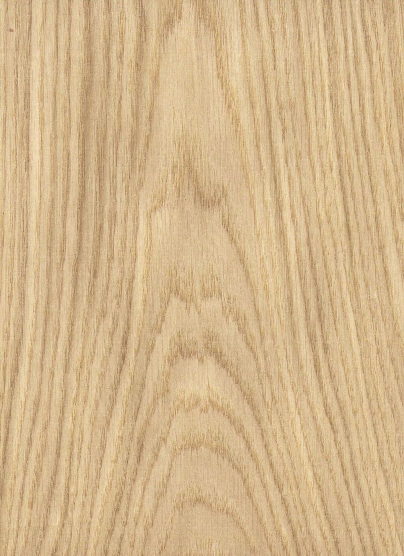 A close up of a piece of wood showing the grain of the wood.